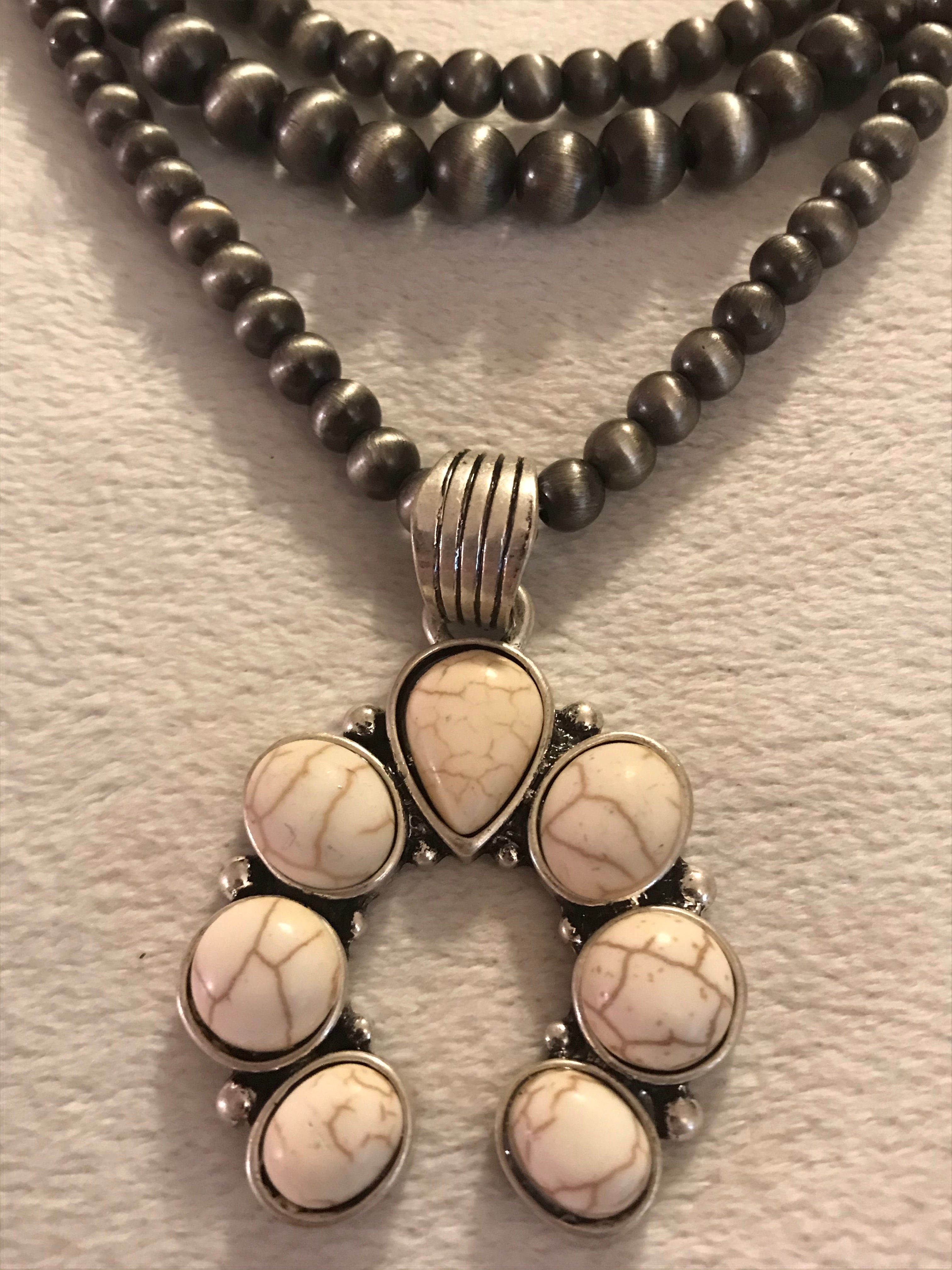 Silver 3 Strand Necklace with Ivory Pendant